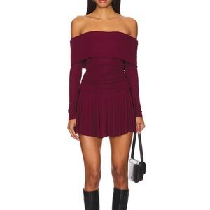 Revolve. 
Maroon Xs dress
never worn. New with tag